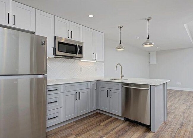 Building Photo - 1850 W 46th Ave