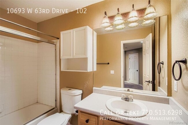 Building Photo - 10693 W 63rd Dr