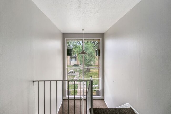 Building Photo - *Beautiful Apartment in Park Like Setting*...