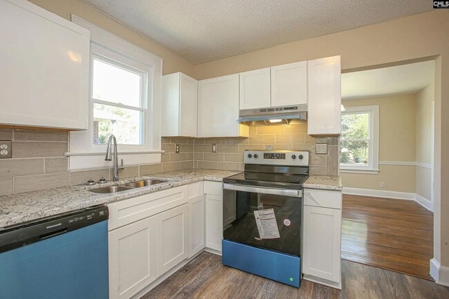 Building Photo - Charming 3-Bedroom Home in the Heart of Rosewood – Available July 2026!