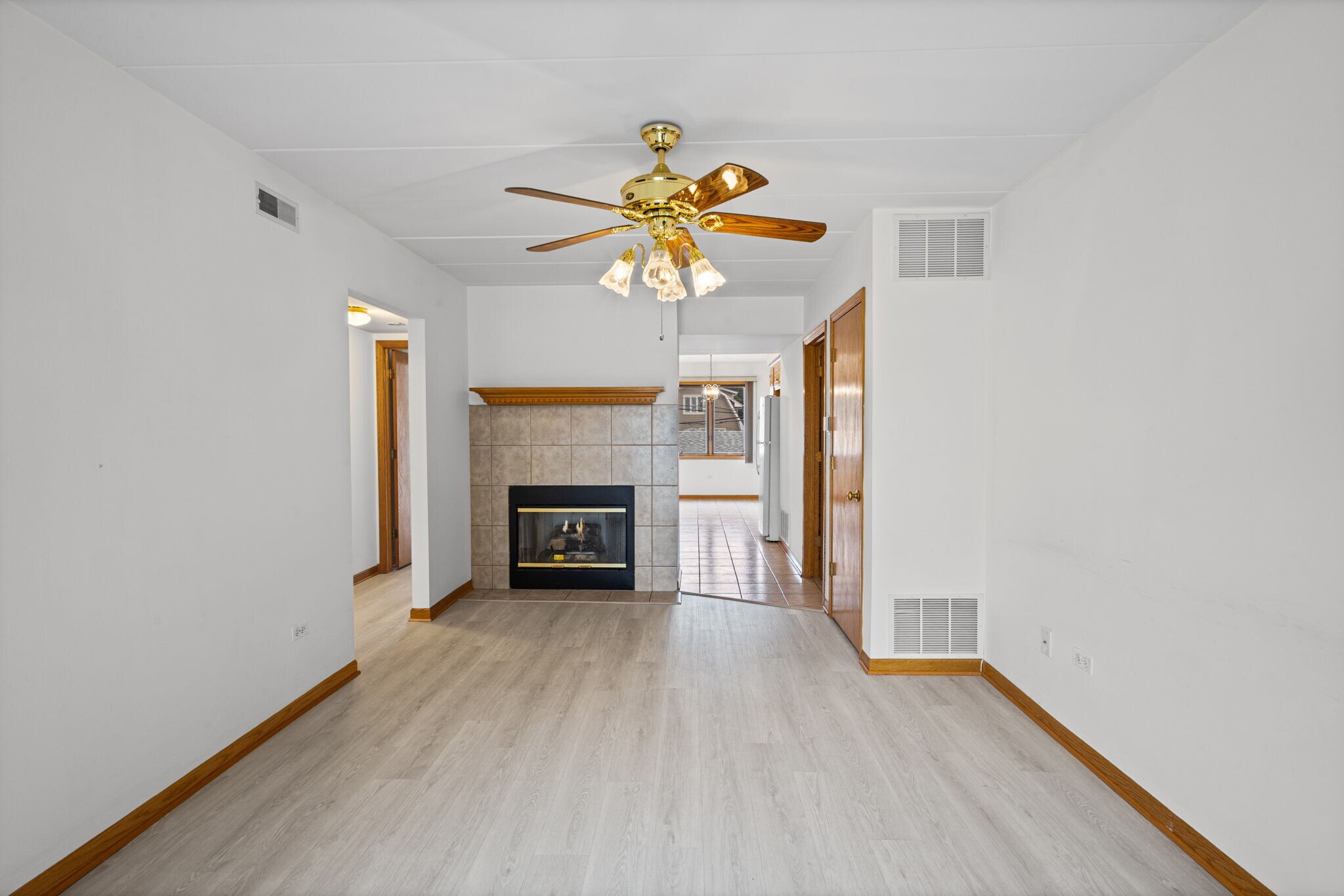 Living room with gas fireplace - 5632 S Narragansett Ave