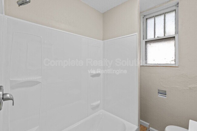 Building Photo - 7109 Eugene Ave