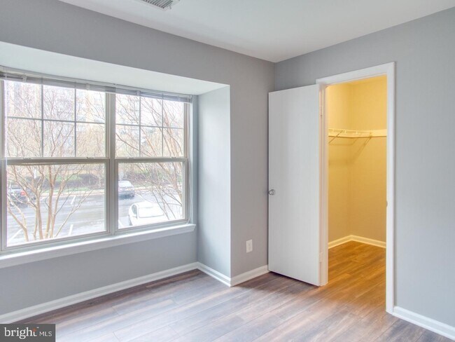 Master Bedroom, with updated built out walk-in closet - 11710 Olde English Dr