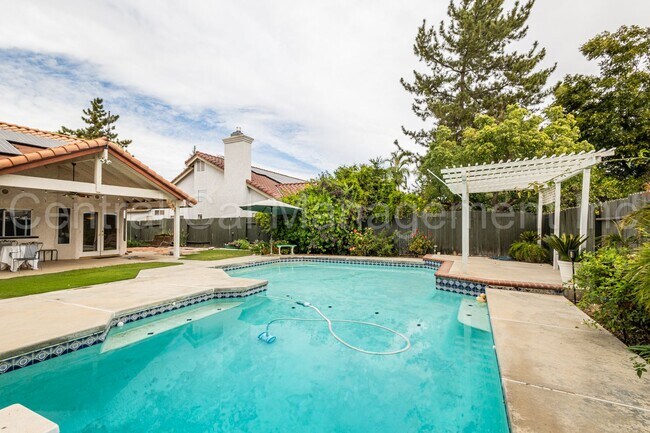 Building Photo - 4 Bedroom/2.5 Bath Home with Paid Solar an...
