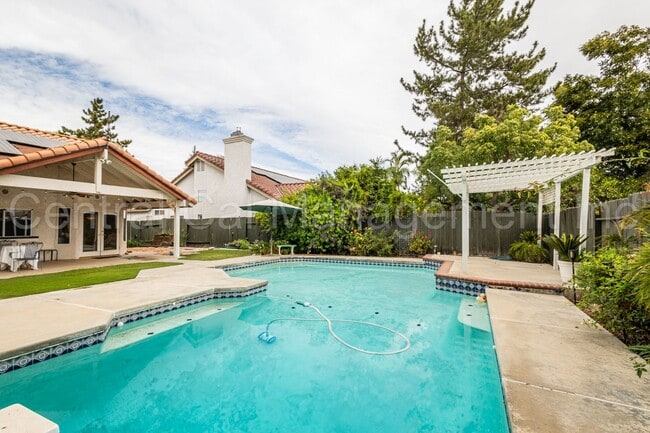 Building Photo - 4 Bedroom/2.5 Bath Home with Paid Solar and a Pool - $2950 Per Month!