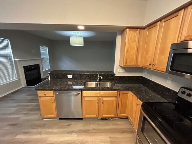 Building Photo - **Spacious 4-Bedroom Home with Walk-In Clo...