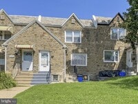 Building Photo - 5971 Woodcrest Ave