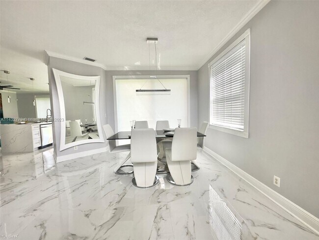 Building Photo - 3 br, 2.5 bath House - 8910 NW 45th Ct # 0