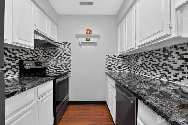Building Photo - 5208 Ravens Crest Dr