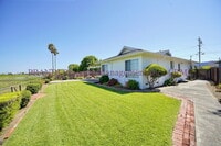 Building Photo - Serene Living on the Water’s Edge – Bright...