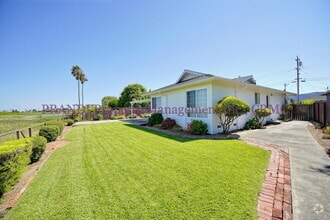 Building Photo - Serene Living on the Water’s Edge – Bright...