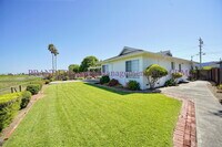 Building Photo - Serene Living on the Water’s Edge – Bright...