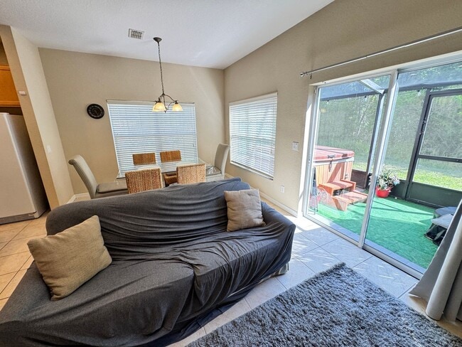 Building Photo - Fully Furnished 5-Bed End-Unit Townhome with Hot Tub in Gated Coral Cay! WASHER & DRYER INCLUDED!