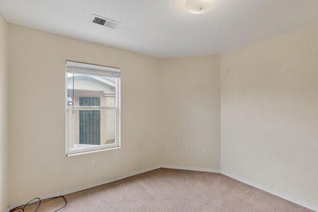 Building Photo - 9000 Violet Orchid Tr SW