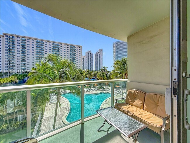Building Photo - 19380 Collins Ave