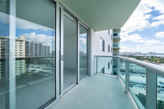 Building Photo - 19380 Collins Ave
