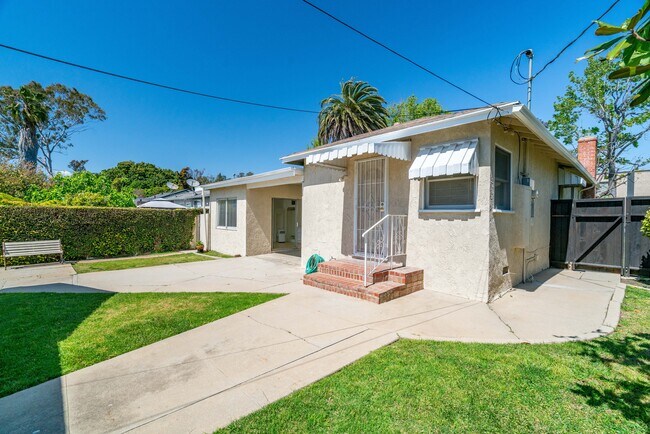 Rear door view brick with awning - 2935 Westwood Blvd