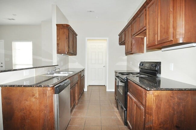 Building Photo - 7600-7602 Novella Drive