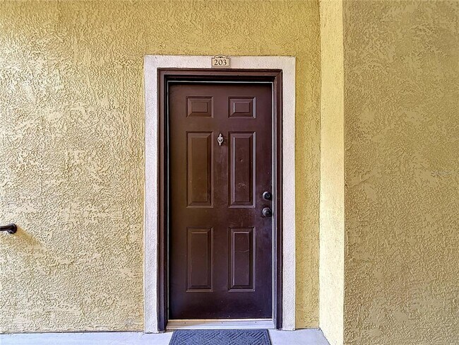 Building Photo - 10201 Courtney Palms Blvd