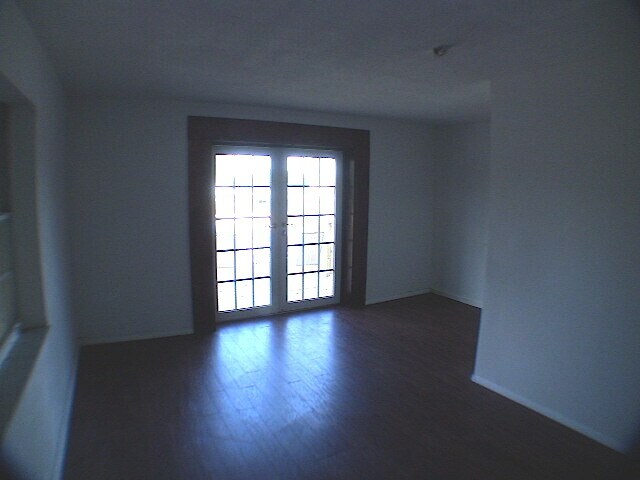 Master bedroom with French doors to deck - 401 Sunshine Dr