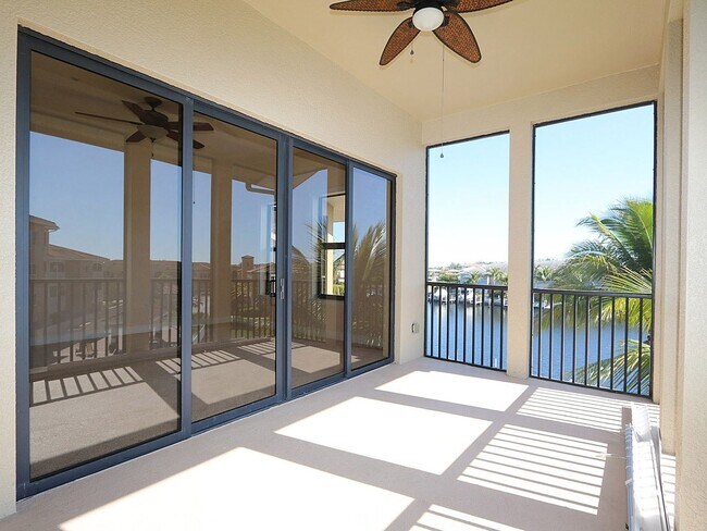 Building Photo - BEAUTIFUL 3-BEDROOM  WATERFRONT CONDO WITH BOAT SLIP AND HEATED POOL