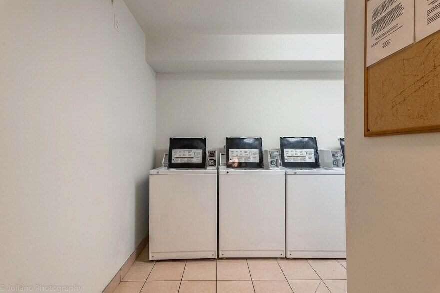 large clean laundry room - 450 NW 20th St