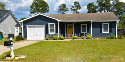 Building Photo - Suburban Oasis: Charming 3-Bedroom Home wi...