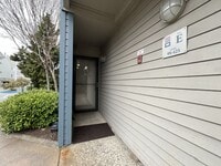 Building Photo - Ground Floor End Unit on Jantzen Beach with River Views & Flexible Living Space