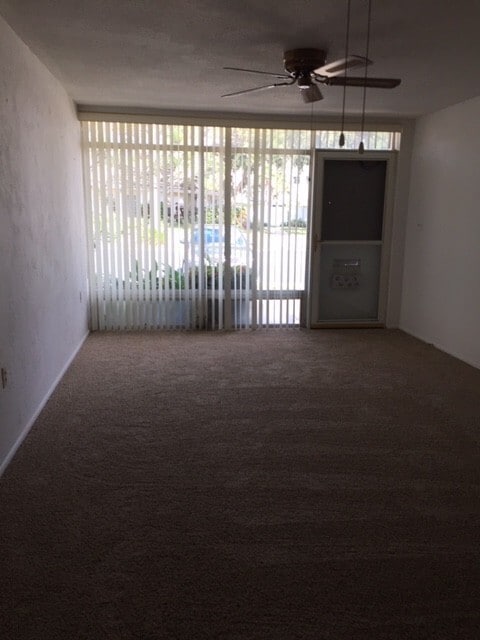 Building Photo - 55+, quaint 2/1 in a gated community locat...