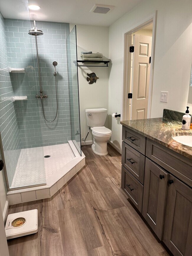 Building Photo - Dream Home in Highland, Michigan: Your Private Oasis on 5 Wooded Acres