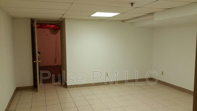 Building Photo - 112 E 5th St