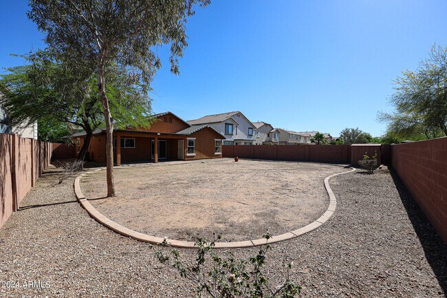 Building Photo - 7423 W Pueblo Ave