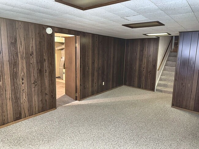 Building Photo - Spacious 3-Bedroom Split-Level with Formal Dining Room, Fireplace, and Fenced Backyard