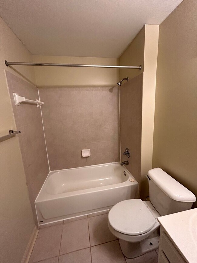 Building Photo - Two Bedrooms Available in this Three Bedroom Flat, Female Applicants!