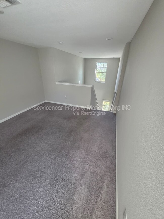 Building Photo - 7418 Rosy Periwinkle Ct