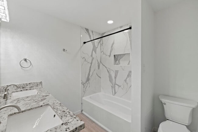 Building Photo - Stylish & Renovated Townhome in Prime West...
