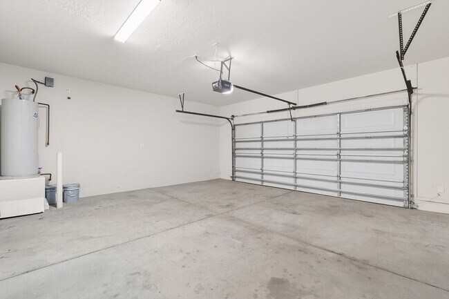 Building Photo - Three Bedrooms! Newer Neighborhood - conve...