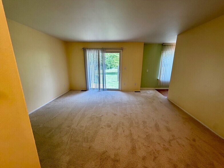 Living room with new carpet in 2026 - 3234 Bolgos Cir