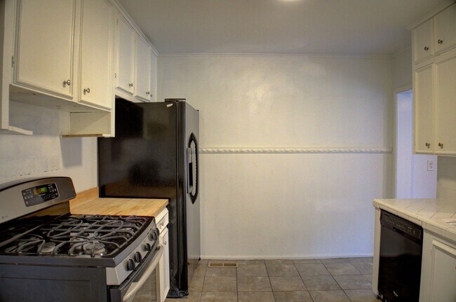 Building Photo - 3-bedroom, 2.5-bath home with mostly hardwood floors