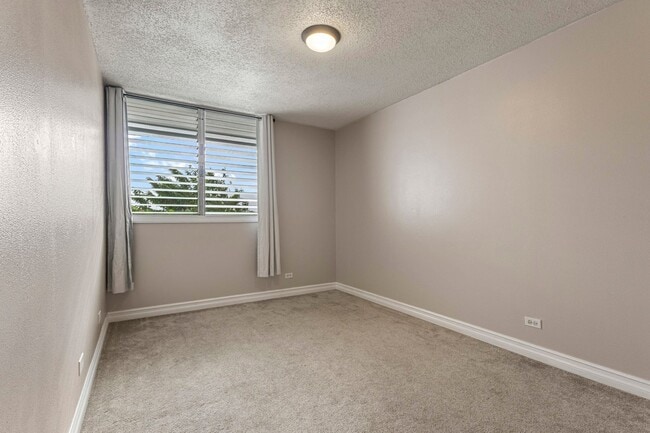 Building Photo - Updated 2-Bedroom Condo with Koolau Views in Prime Kaneohe Location