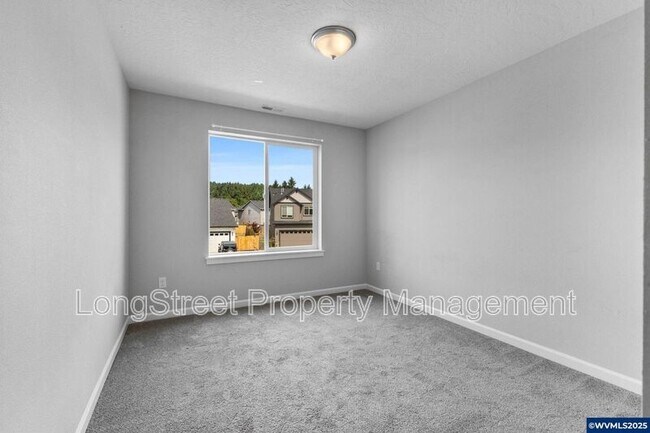 Building Photo - 7177 SE Sarah Dr