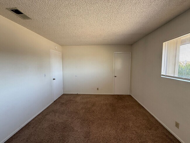 Building Photo - Large Two Story Condo with Two Car Detache...