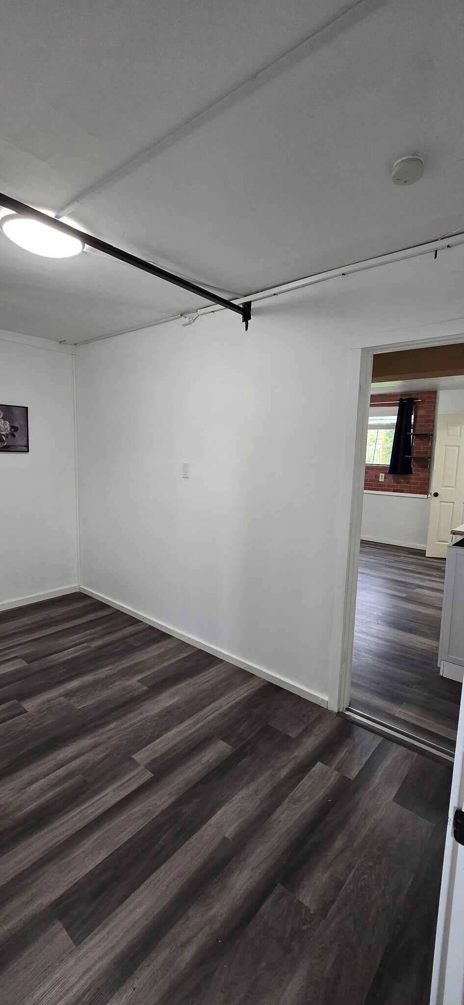Expanded Room flows into main room - 7621 46th Pl W