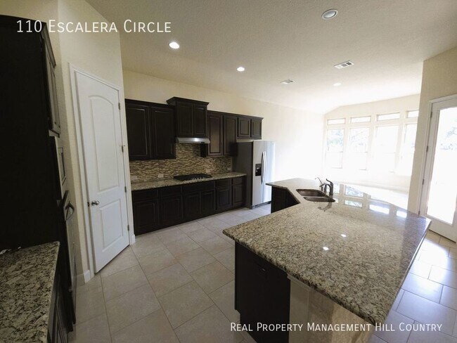 Building Photo - Luxurious Living in a Gated Community - 4 ...