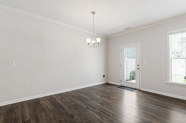 Building Photo - Stylish 4-Bedroom Townhome with Backyard O...