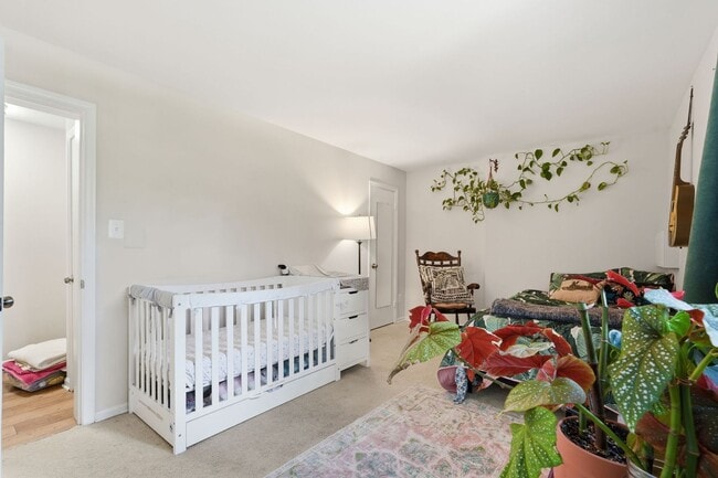 Building Photo - This beautifully refreshed condominium offers a refined blend of style and comfort