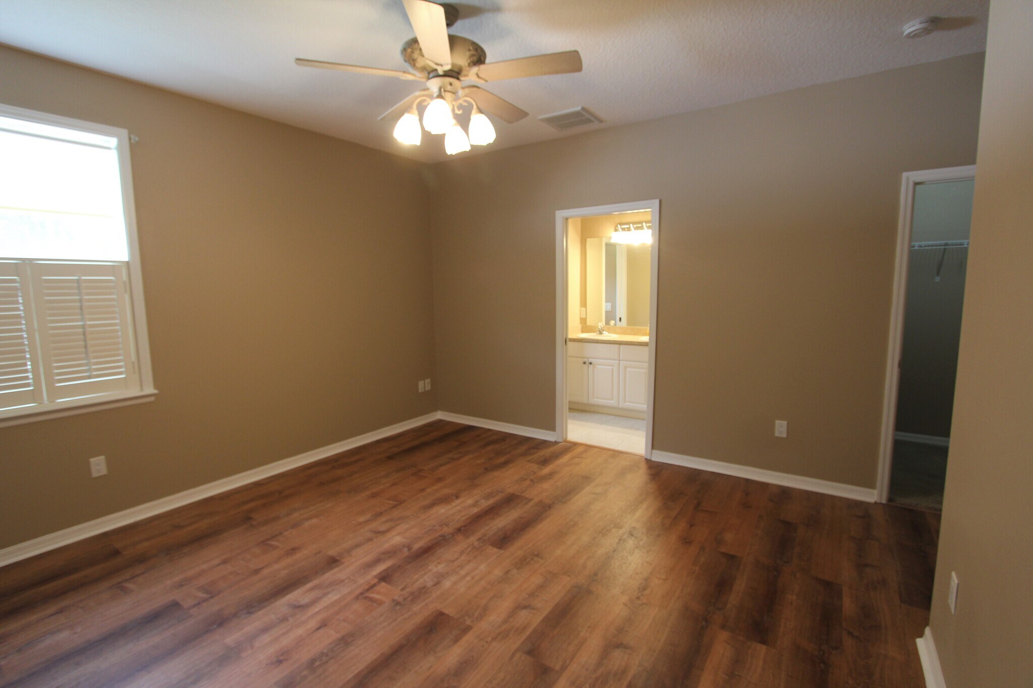 Master bedroom, sliding pocket door to dressing area - 37410 Picketts Mill Ave