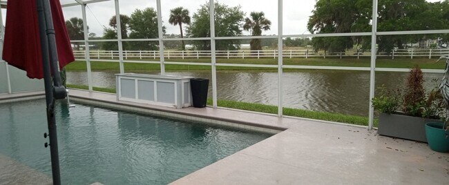 Building Photo - Beautiful Port Orange 4 Bedroom 2 Bathroom Pool Home