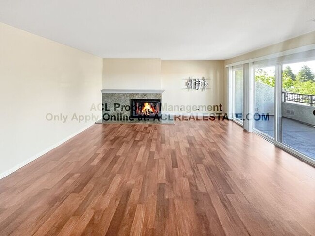 Building Photo - Bright 2BR/2BA Condo with Garage & Pool in...