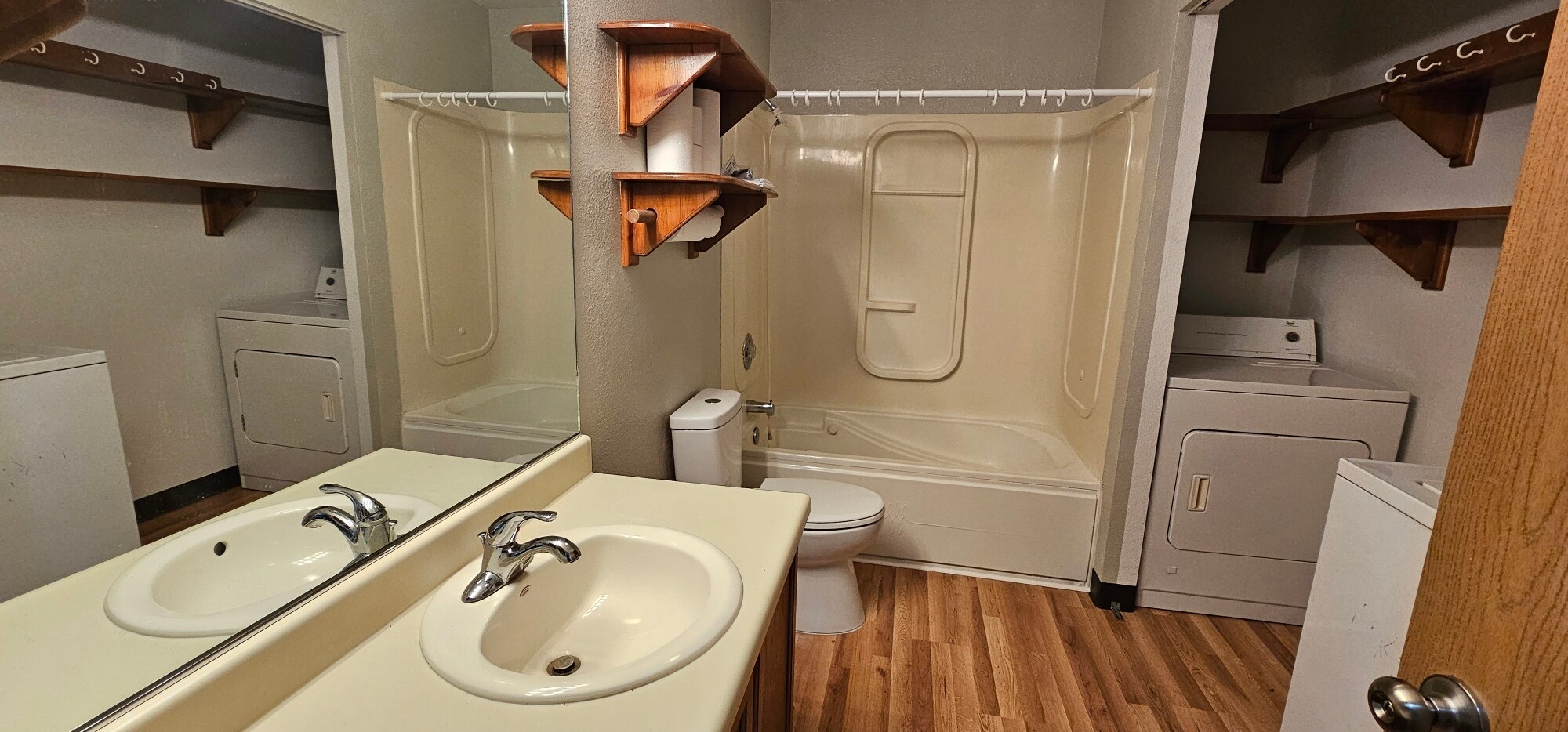 Bathroom with full tub and laundry area( washer/dryer can stay, but not serviced by owner) - 1352 N Pioneer Peak Dr